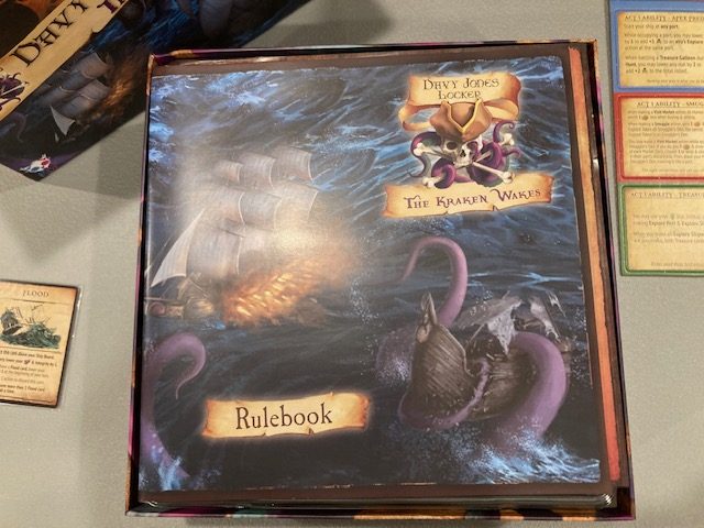 The new box art & title for our game, Davy Jones' Locker: The Kraken Wakes.  Let us know what you think! : r/tabletopgamedesign
